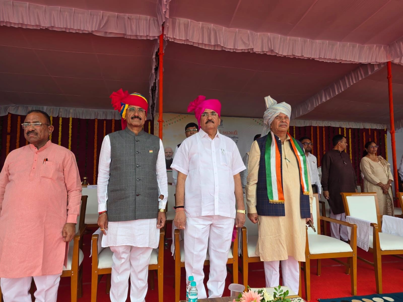 Bharatsinhji Dabhi standing for the national anthem at an Independence Day programme