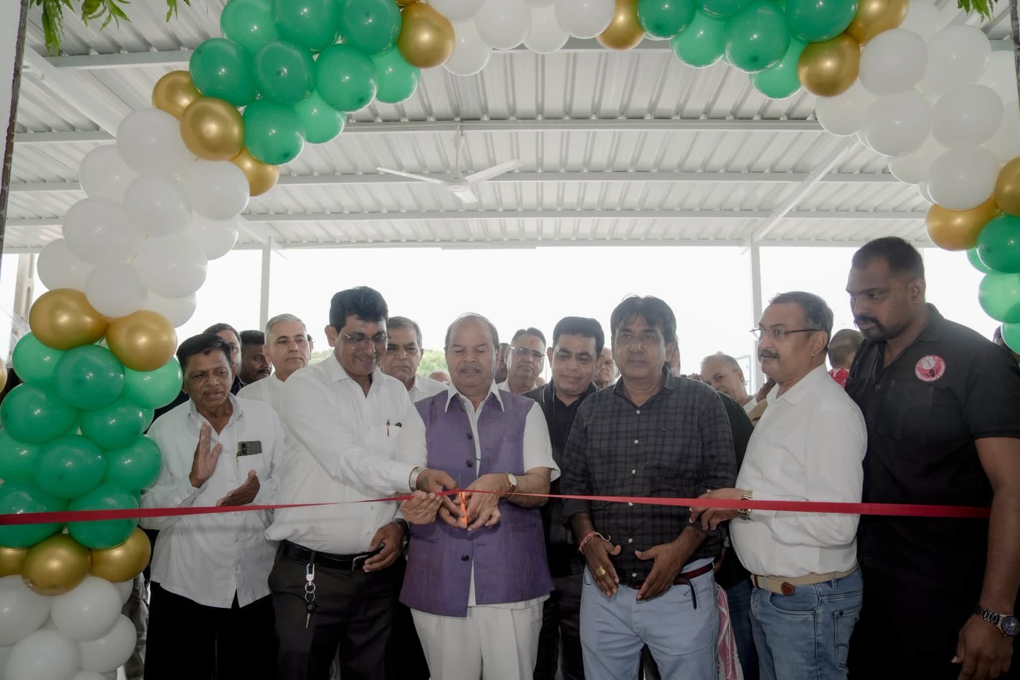Cutting the ribbon at the inauguration of a new public facility.