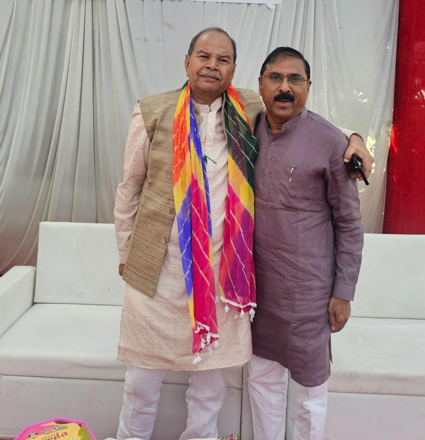 With a fellow public representative at a public function.